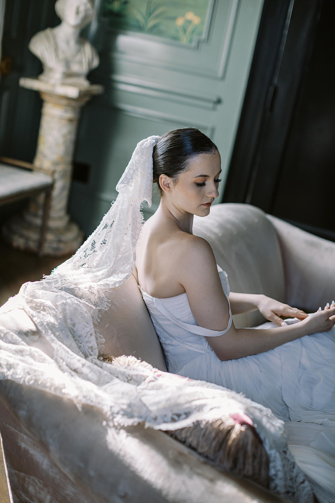 Bride wearing lace bow veil alternative