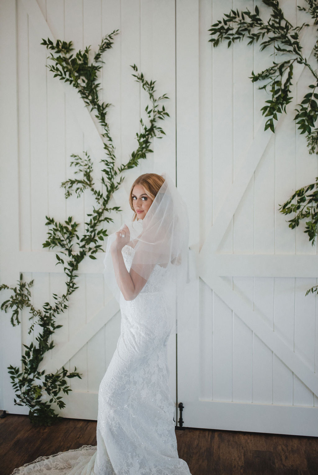 Fingertip length wedding veil with blusher