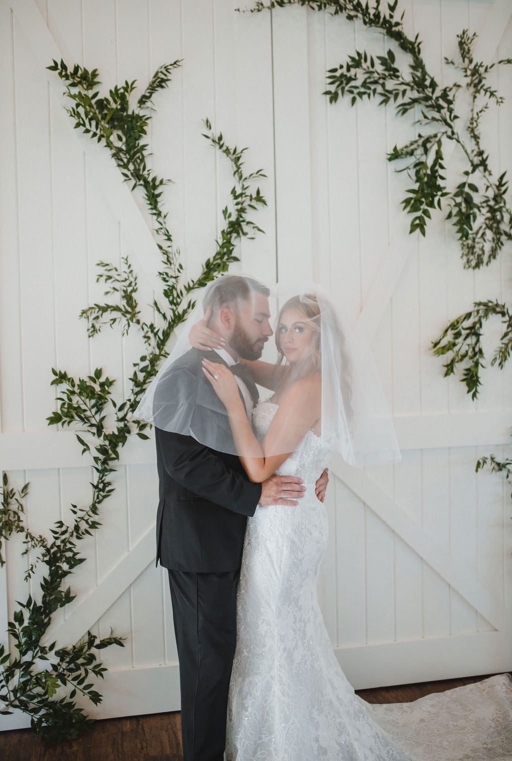 Fingertip length wedding veil with blusher